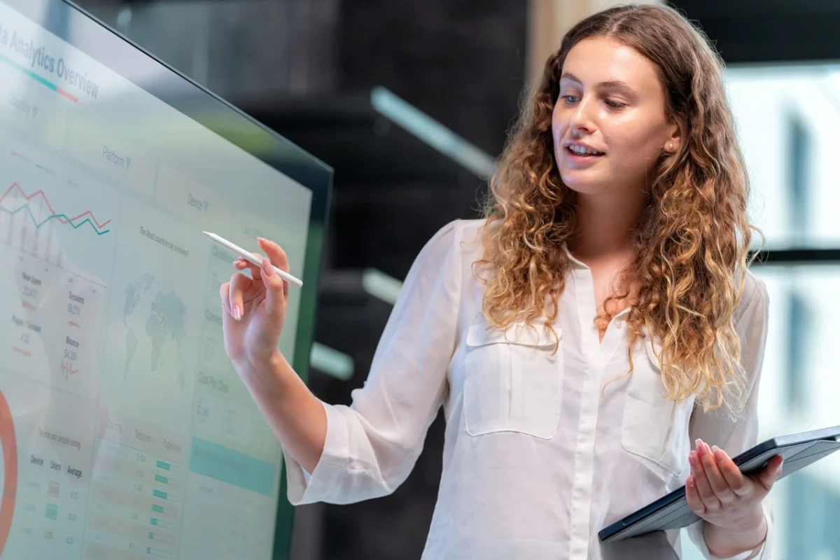 Professional explaining complex data during corporate presentation skills training