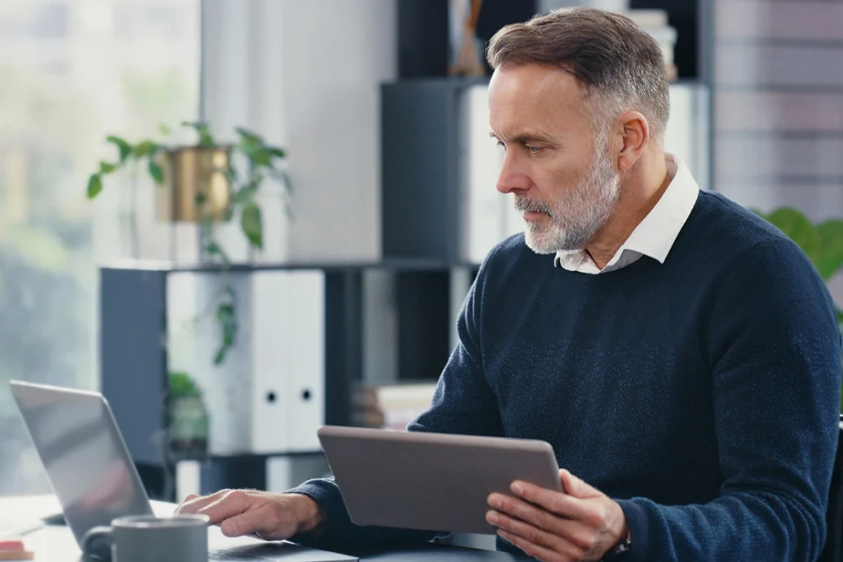 Man using AI to draft and refine powerful messaging